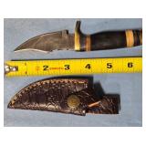 Trailing point blade knife w/jimping on spine.