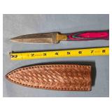 Spear point knife w/wood handle. Damascus steel.