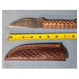 Straight blade knife w/jimping on spine.