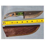 Straight blade knife w/two tone wood handle.