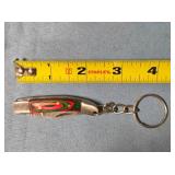 Small folding knife w/key chain.