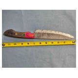 Drop point blade knife. Two tone wood handle.