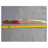 Straight blade knife. Two tone wood handle.