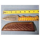Drop point blade knife. 8" length. Damascus steel