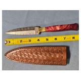 Spear point knife w/composite handle.