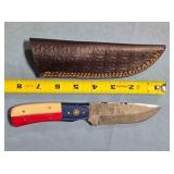 Straight blade knife w/jimping on spine.