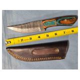 Trailing point blade knife w/jimping on spine.