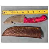 Trailing point knife w/gut hook. 8" length.