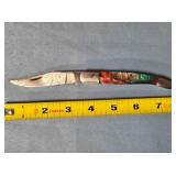 Folding knife. Composite handle. Damascus steel.