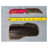 Talon blade knife w/jimping on spine.