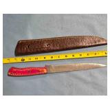 Straight blade knife. 14" overall. Damascus steel.