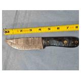 Drop point knife  w/jimping on spine.