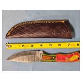 Drop point blade knife w/jimping on spine.