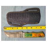 Talon blade knife w/jimping on spine.