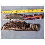 Serrated straight blade knife w/wood handle.