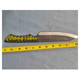 Drop point kitchen knife. Carved wood handle.