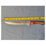 Straight blade knife w/choil. Carved wood handle
