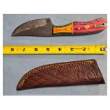Straight blade knife w/two tone wood handle.