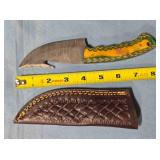 Trailing point blade knife w/gut hook.
