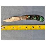 Barlow-style folding knife w/composite handle.