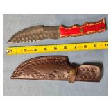 Serrated straight blade knife w/thumb rest.