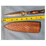 Dagger blade w/wood handle.