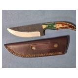 Straight blade knife w/wood handle.
