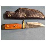Straight blade knife w/wood handle & guard.