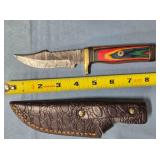 Trailing point blade knife w/jimping & guard.
