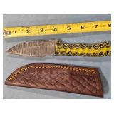 Drop point blade knife w/smooth jimping on spine.