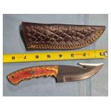 Straight blade knife w/gut hook. Damascus steel.