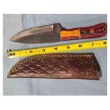 Drop point blade knife w/2 tone wood handle.