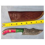 Trailing point blade knife w/thumb rest.