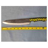 Drop point kitchen knife. Carved wood handle.