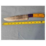 Kitchen butcher knife. Two-tone wood handle.
