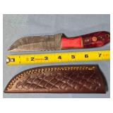 Straight blade knife w/spine jimping.