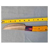 Trailing point kitchen knife. Two-tone wood handle
