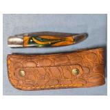 Folding pocket knife w/Damascus steel drop point.