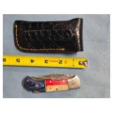 Clip point folding knife w/jimping. Damascus steel