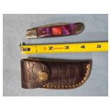 Folding pocket knife. Damascus steel.