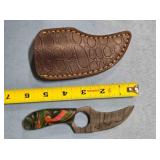 Trailing point blade knife w/jimping & finger hole