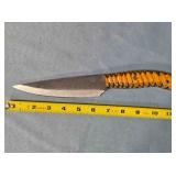 Drop point kitchen knife. Carved wood handle.