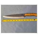 Drop point kitchen knife. Carved wood handle.