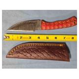 Straight blade knife w/jimping on spine.