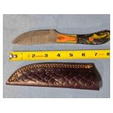 Drop point blade knife. Damascus steel.