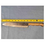 Drop point kitchen knife w/carved wood handle.