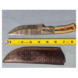 Straight point blade w/jimping. Damascus steel.