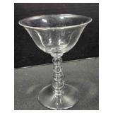 Four bead tall flared glass sherbet dish. 5" tall.