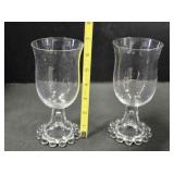 Two glass Candlewick stemmed water goblets.