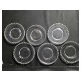 8 glass plates. 6" diameter. 3 1/2" total height.